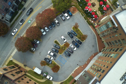 Aerial view of many colorful cars