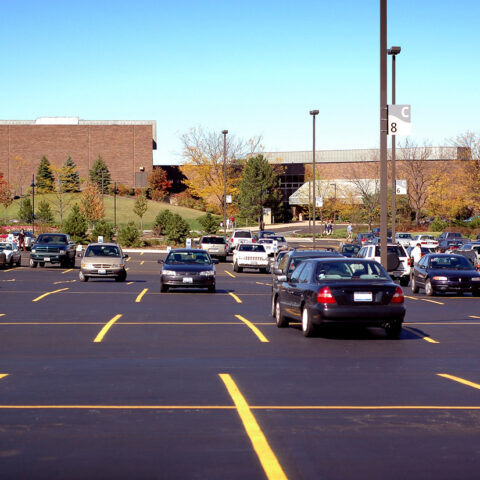 Parking lot with some random cars.